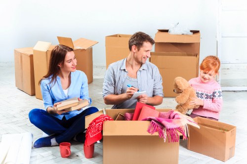Careful loading of furniture for pick-up in Earlscourt