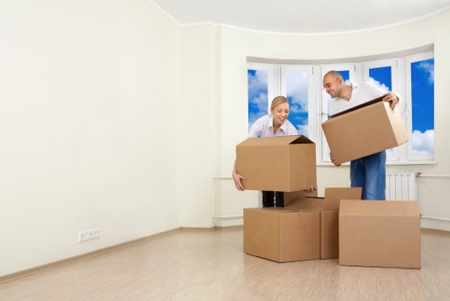 Coordinated office move with labeled boxes and equipment in Earlscourt