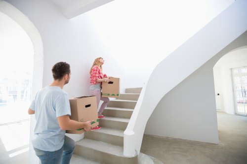 Movers unloading household items at a home in Earlscourt