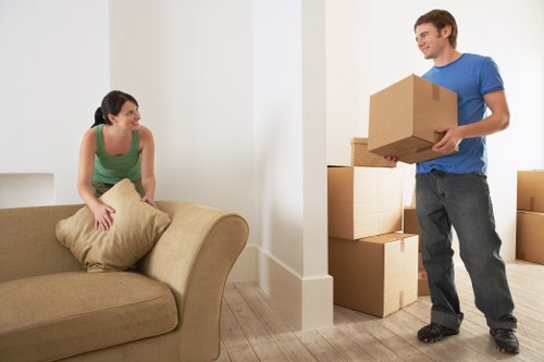 Removal crew unloading boxes at a new Earlscourt home