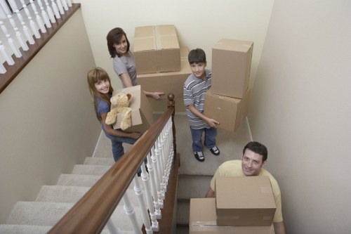 Professional movers handling fragile items during removals in Earlscourt